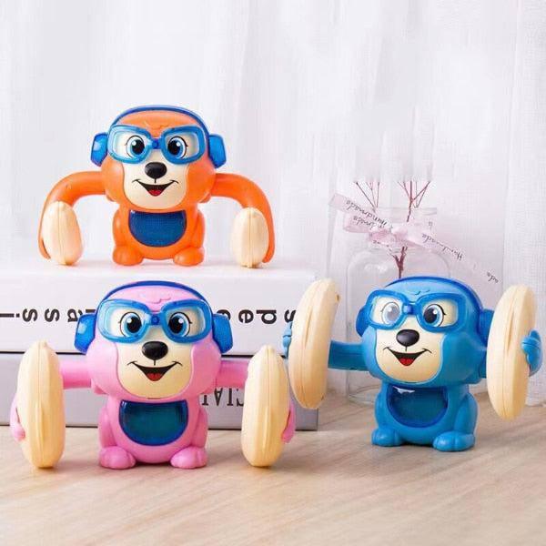 צעצוע חשמלי קוף אורקולי מתגלגל לעידוד זחילה | ג'סטה שופ | Jesta Shop